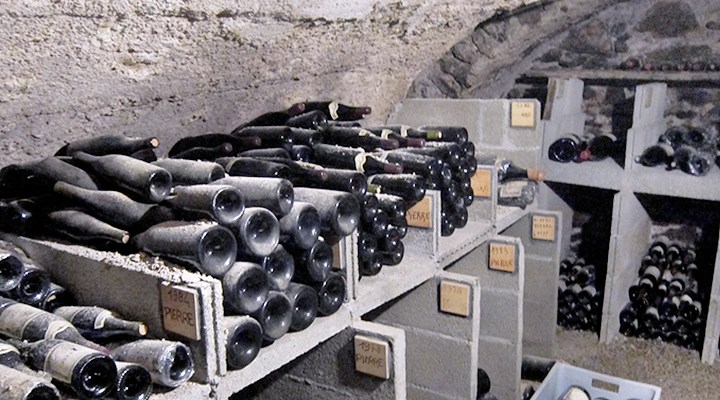 A portion of the Barge <i>Vinotheque</i>.  In this picture are the family’s last remaining bottles made by Gilles’ father, Pierre.